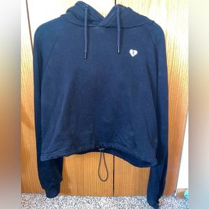 Womens best adjustable cropped hoodie! Black, size medium and lightly worn!
